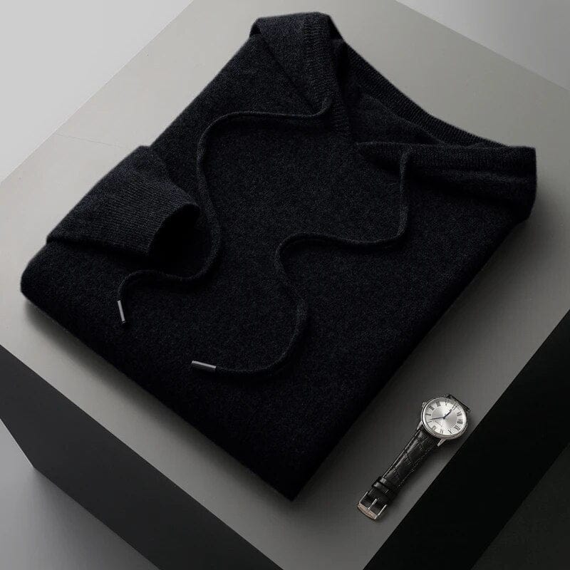Men's gray minimalist knit pullover hoodie with structured drawstring hood and ribbed cuffs
