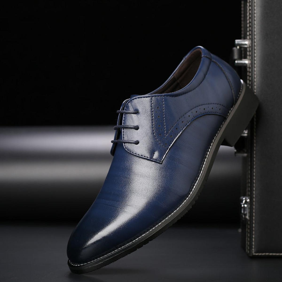 Men's black classic lace-up dress shoes with sleek polished finish for formal occasions