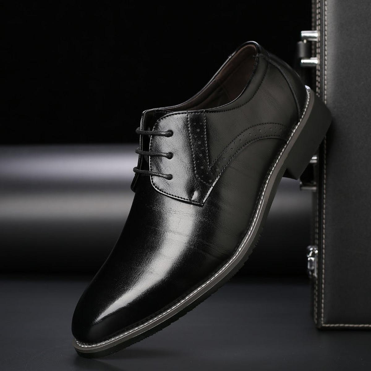 Men's black classic lace-up dress shoes with sleek polished finish for formal occasions