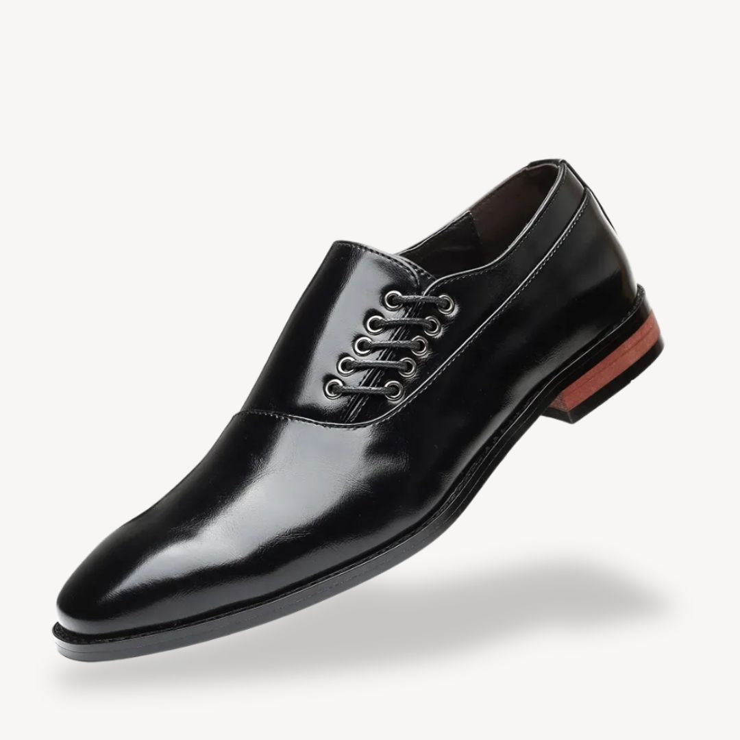 Men's black pointed-toe Oxford dress shoes with side lace-up closure for formal professional wear