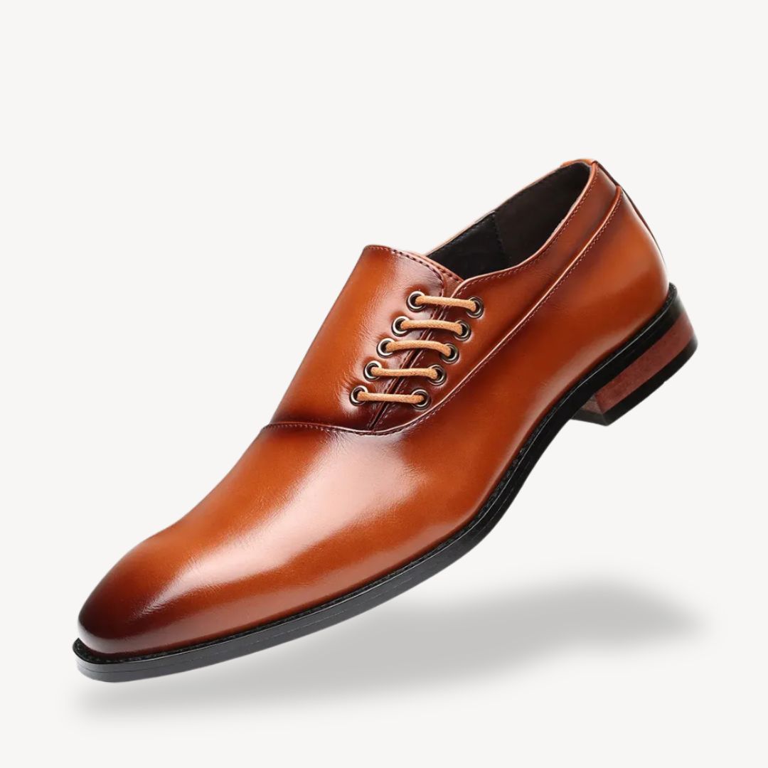 Men's black pointed-toe Oxford dress shoes with side lace-up closure for formal professional wear