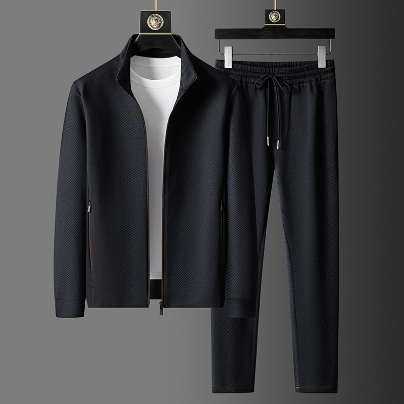 Men's gray zip-up tracksuit set with tapered joggers, smart casual minimalist two-piece travel style