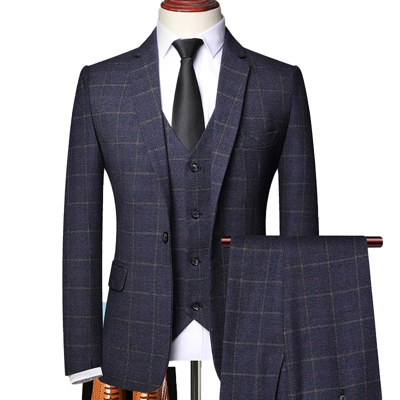 Men's classic three-piece suit in timeless cut featuring matching blazer, waistcoat, and tailored trousers