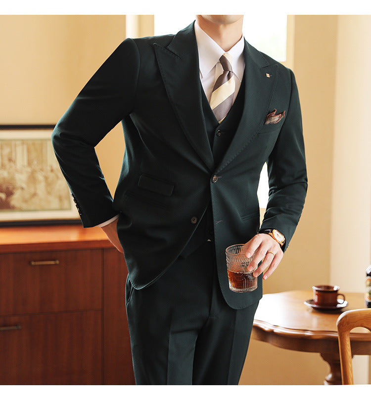 Men's slim tailored three-piece suit notch-lapel blazer waistcoat trousers formal wedding ensemble