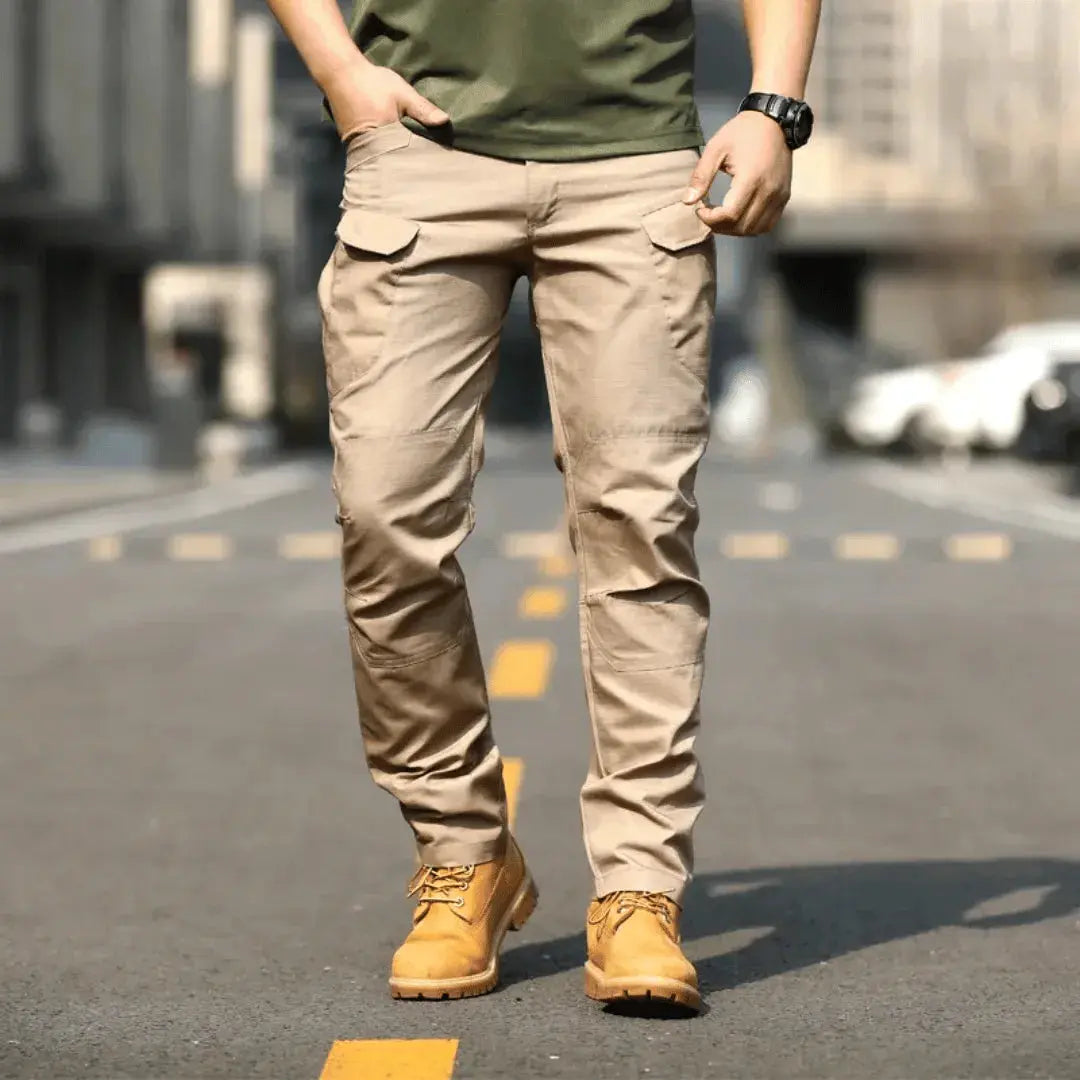 Men's olive tactical cargo pants rugged lightweight cut with multi-pocket design for outdoor adventures