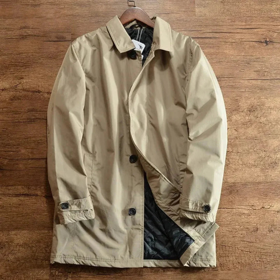 Men's charcoal tailored weatherproof overcoat with classic silhouette and durable weather-resistant finish