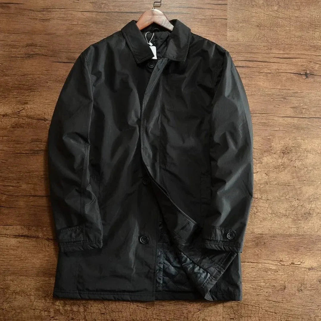 Men's charcoal tailored weatherproof overcoat with classic silhouette and durable weather-resistant finish