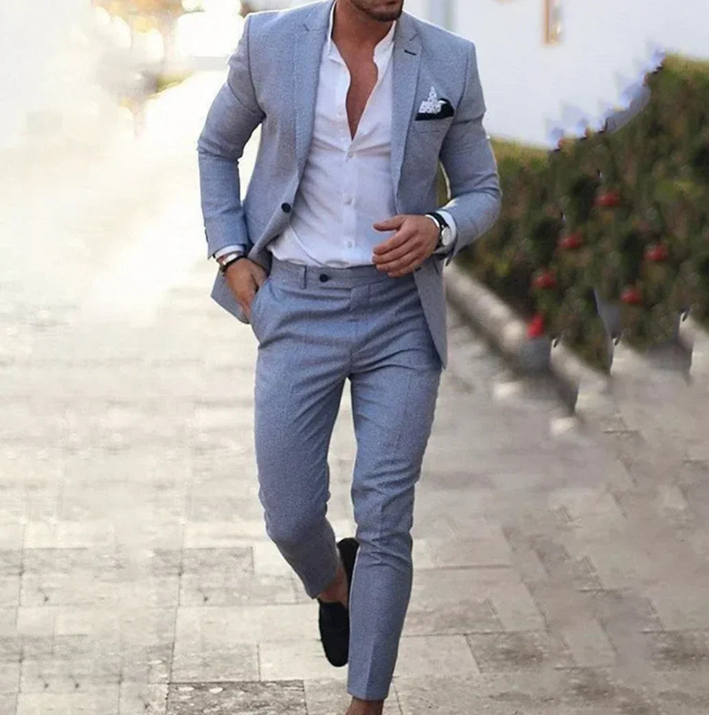 Navy tailored blazer and trousers two-piece suit set with structured slim-fit silhouette for men