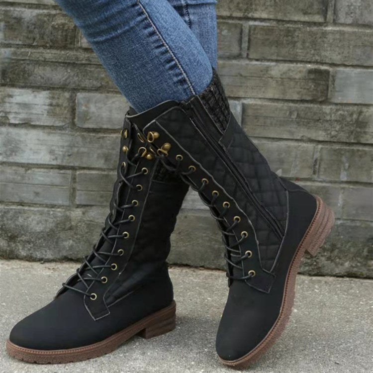 Women's black suede mid-calf motorcycle boots with square toe, thick heel, and front strap detail