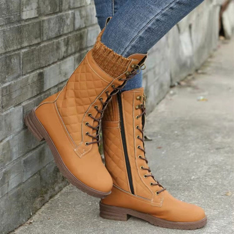 Women's black suede mid-calf motorcycle boots with square toe, thick heel, and front strap detail