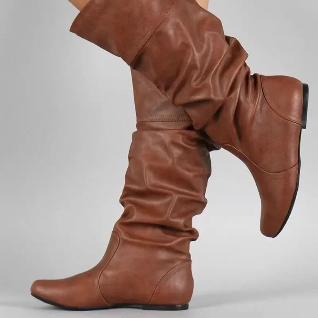Women's mid-calf cowboy boots in tan PU leather with iconic Western stitching and pointed toe