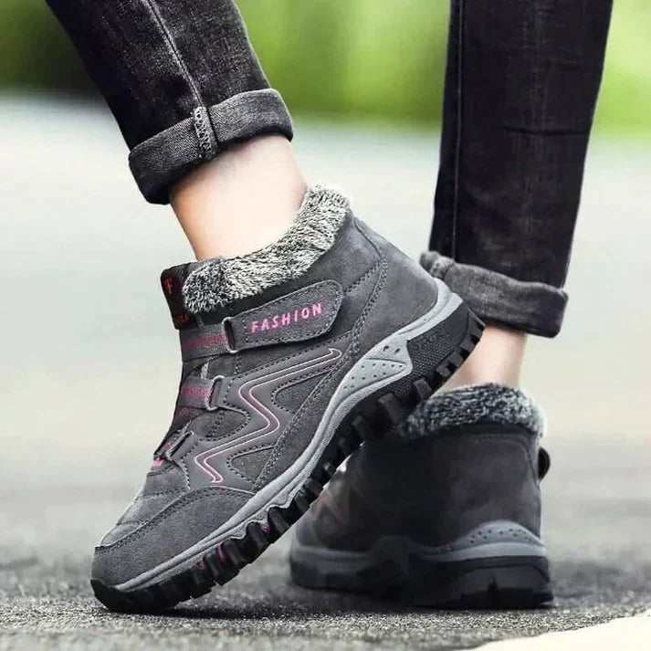 Women's mid-cut lace-up sneakers with fur-lined PU upper for warm active winter lifestyle