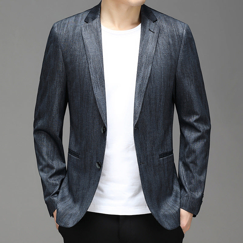 Midnight navy slim-cut textured blazer with silky structured fabric and subtle light-catching sheen