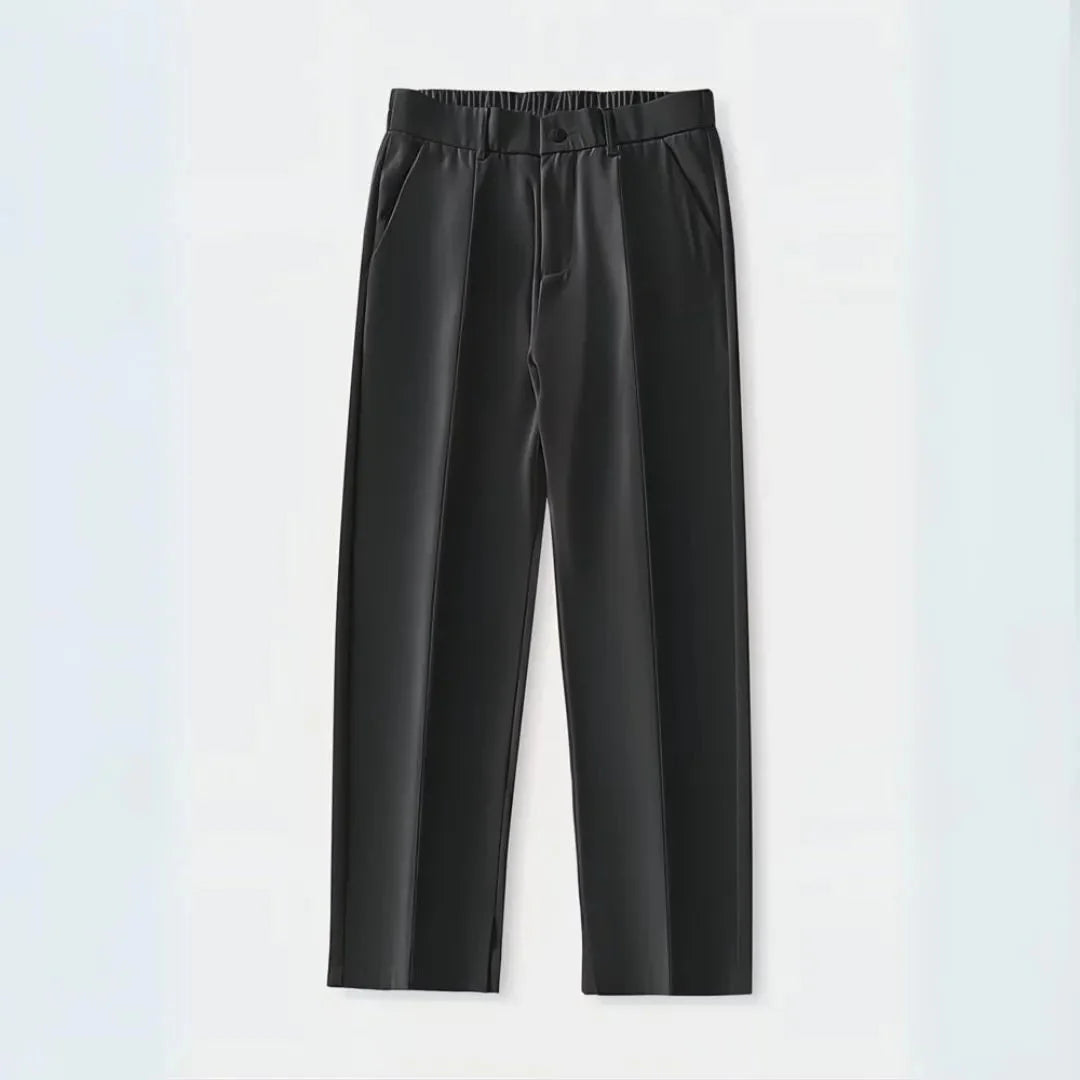 Women's wide-leg pleated dress trousers with elastic waist, fluid drape, and front pleat detail