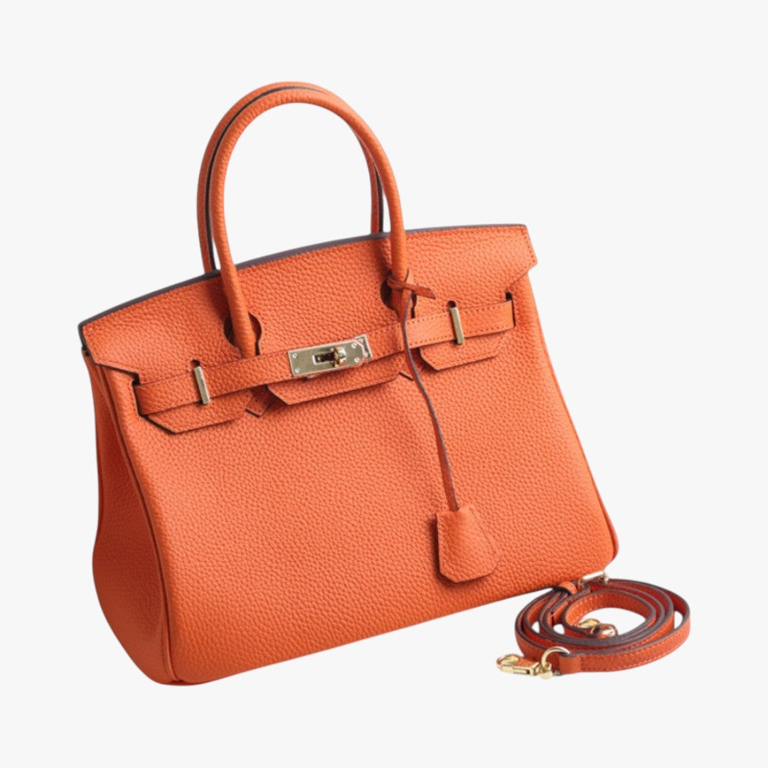Women's premium structured leather handbag with gold-tone hardware and removable shoulder strap