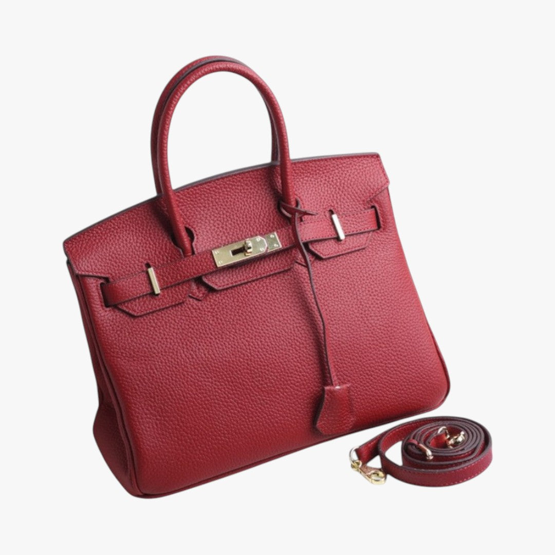 Women's premium structured leather handbag with gold-tone hardware and removable shoulder strap