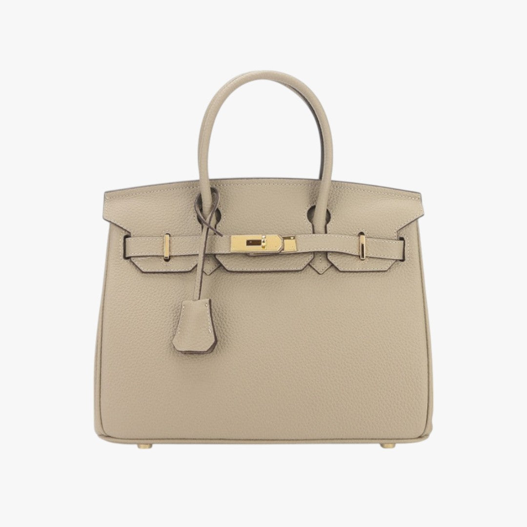Women's structured black leather handbag with gold-tone hardware and removable shoulder strap for professionals