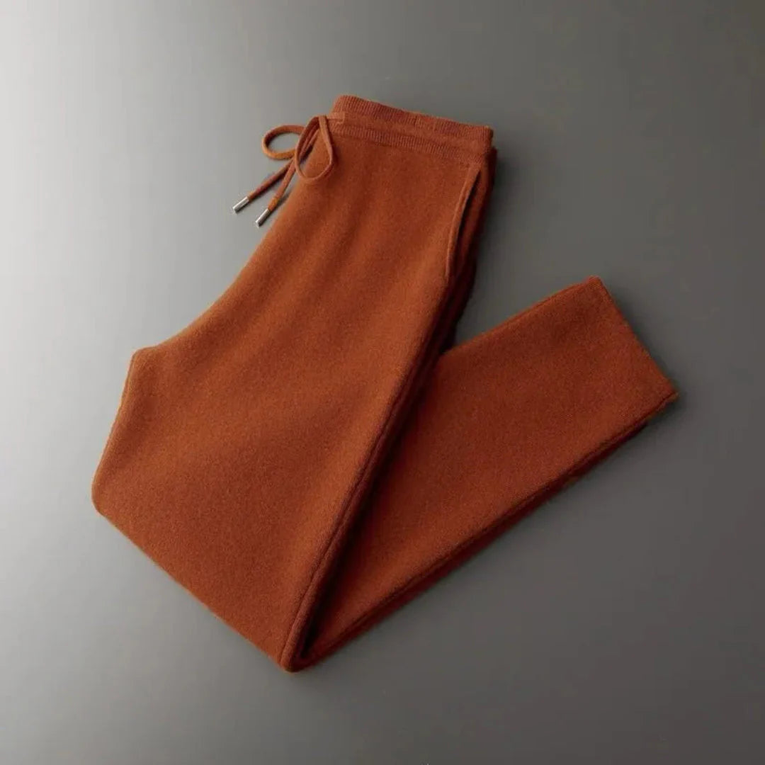 Men's gray merino wool lounge pants with drawstring waist, relaxed fit, breathable everyday comfort