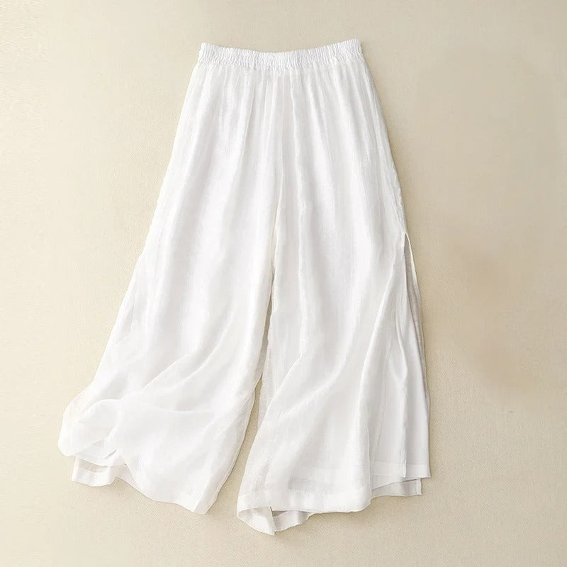 Women's beige wide-leg linen pants with elastic waistband, breezy silhouette for effortless style