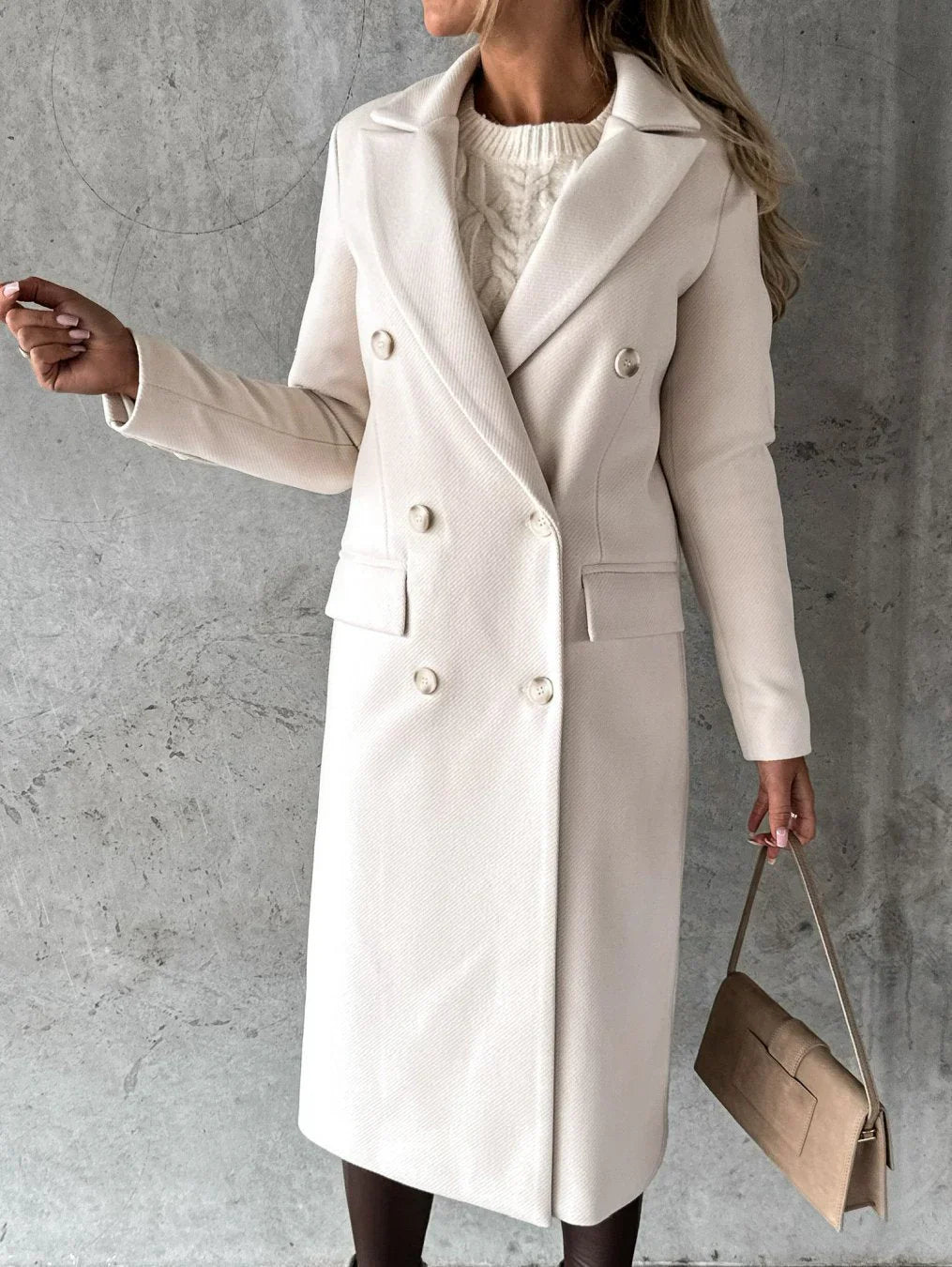 Charcoal double-breasted long coat notched collar front flap pockets tailored professional silhouette