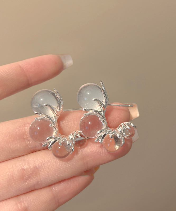 Boucles d'oreilles créoles asymétriques en résine cuivrée et nude modernes en forme de C - Urbann-Vibe