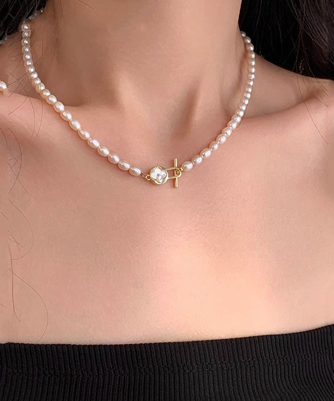 Collier de perles graduées en cuivre blanc surdoré avec trèfle à quatre feuilles - Urbann-Vibe