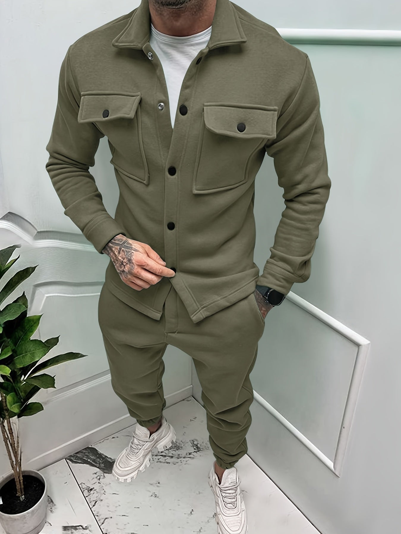 Men's breathable tracksuit set in solid color, slim athletic cut with minimal modern design