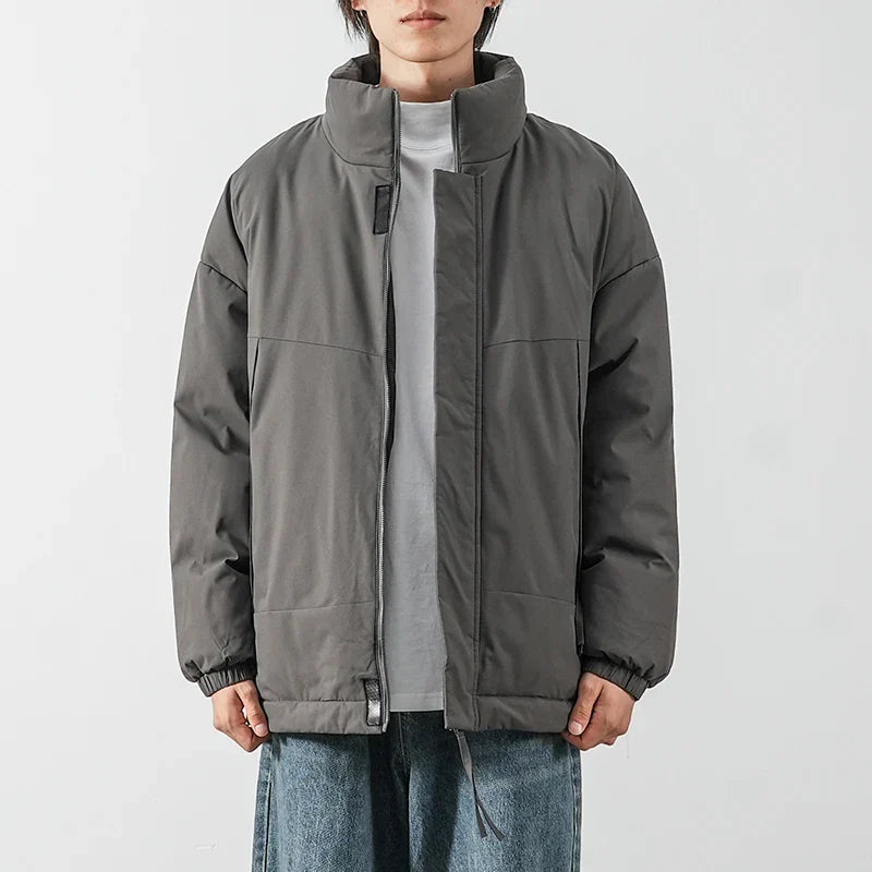 Men's black wind-resistant winter jacket with water-repellent shell and modern urban silhouette