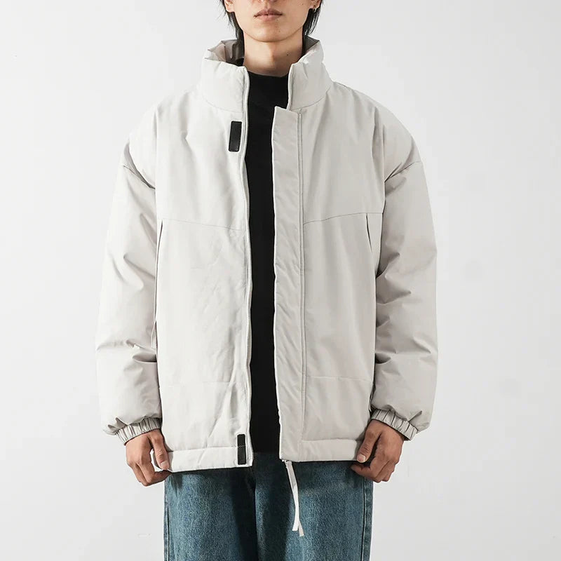 Men's black wind-repellent winter jacket, urban fit with water-resistant shell for cold weather