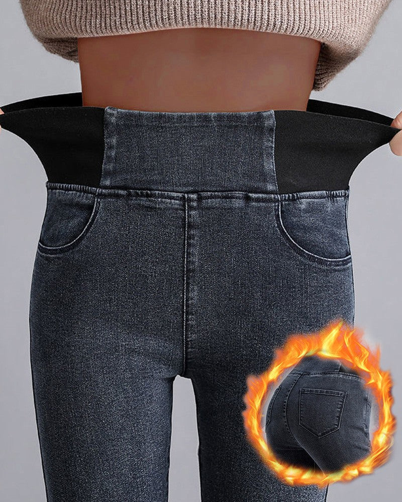 Women's black thermal fleece high-waist leggings with plush interior lining, relaxed fit winter style