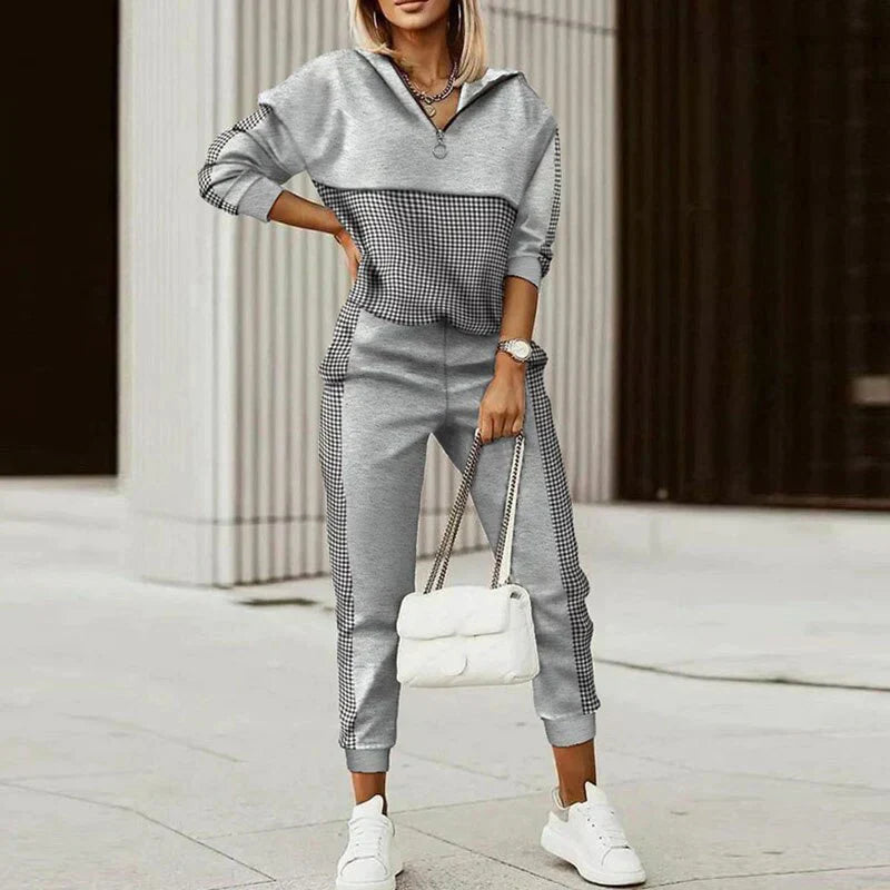 Women's relaxed zip tracksuit set with bold animal print accents, two-piece streetwear lounge travel outfit