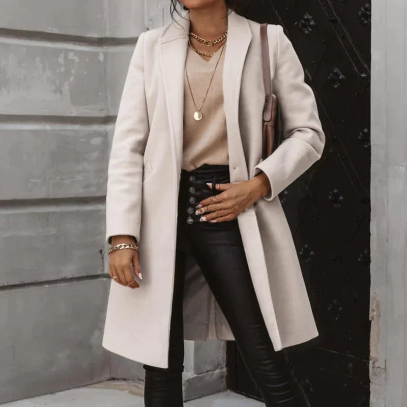 Women's fitted single-breasted winter trench coat with classic collar and practical pockets for workwear