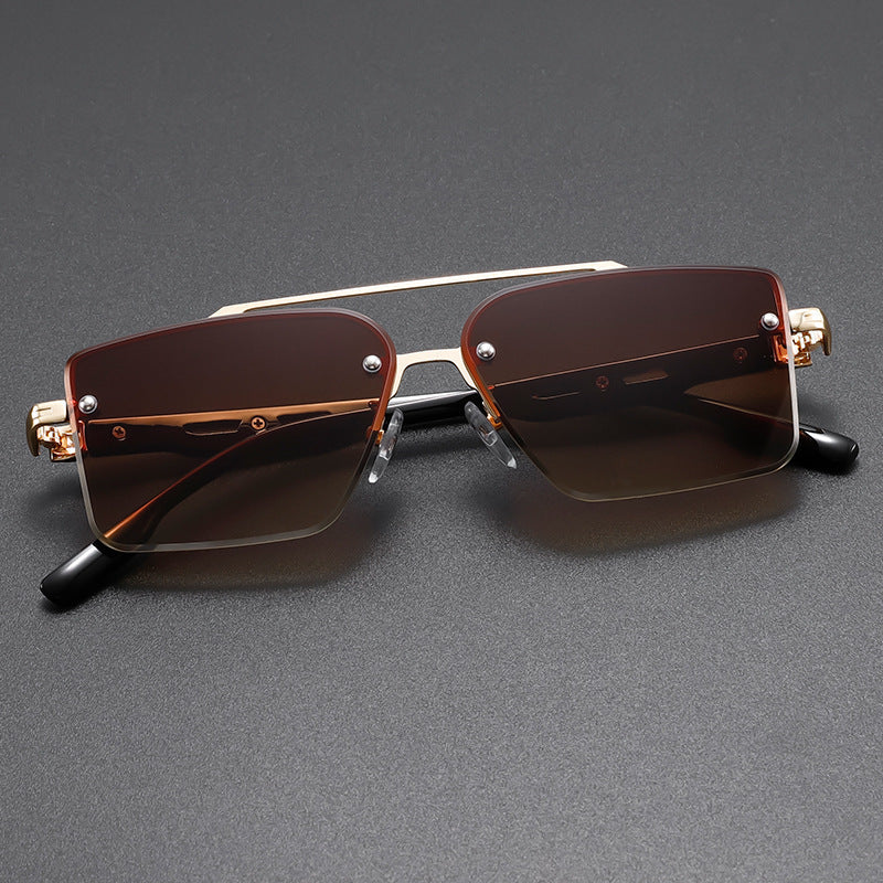 Rimless square sunglasses gold-tone accents lightweight metal frame modern architectural silhouette