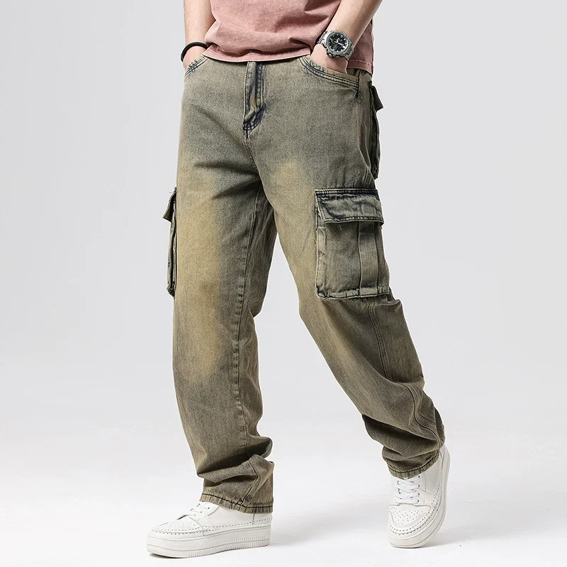 Men's blue distressed denim cargo jeans with rugged weathered wash and bold utility pockets