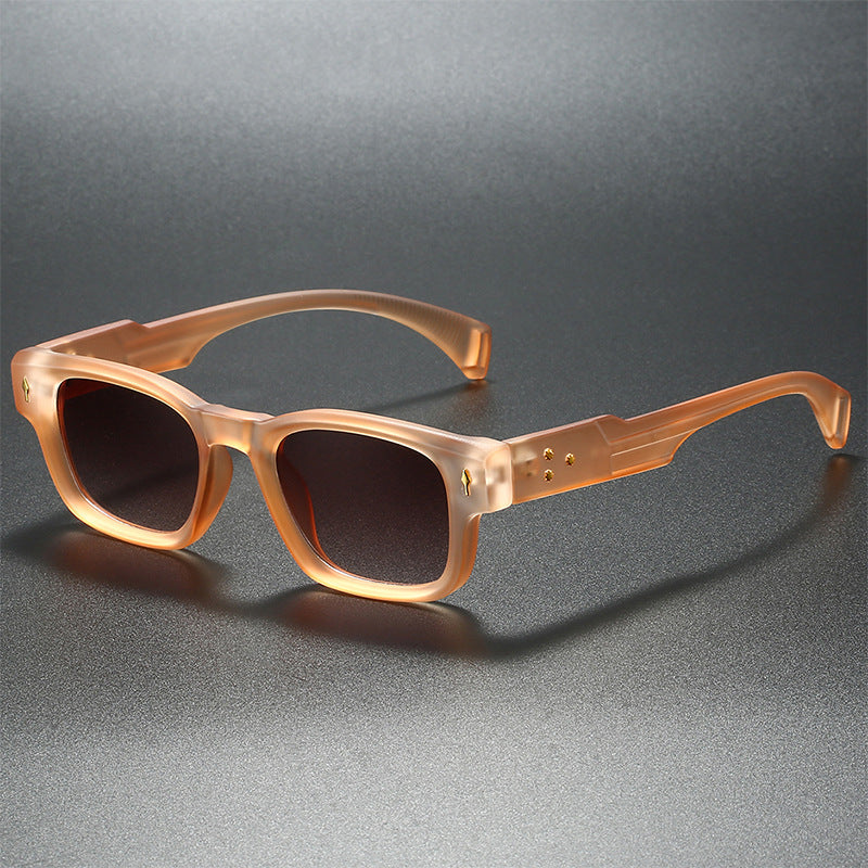 Bold sculpted square sunglasses matte black finish sharp lines smooth curves everyday modern style