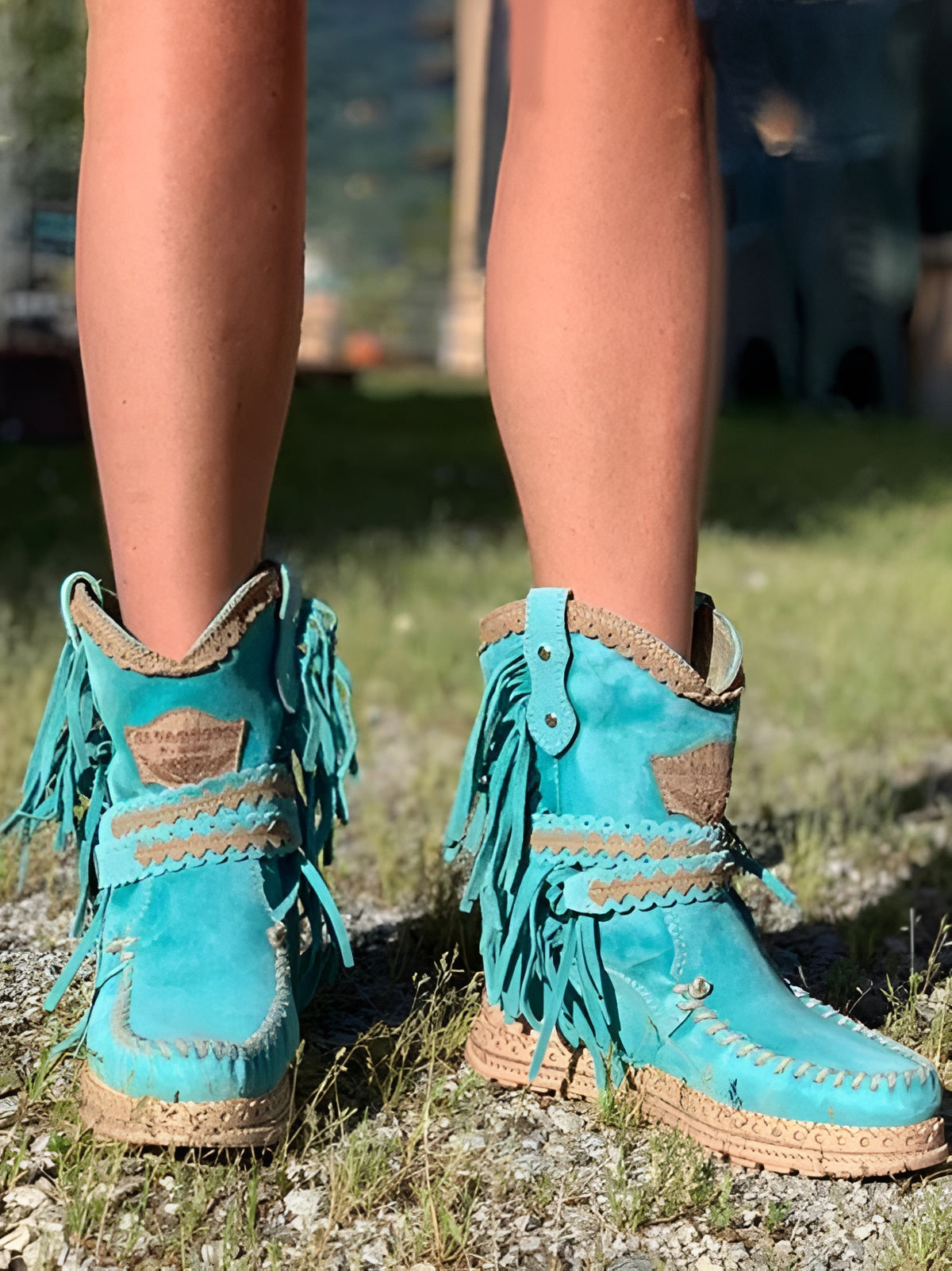 Women's fringe moccasin boots with handcrafted stitching, flowing fringes, lightweight festival style