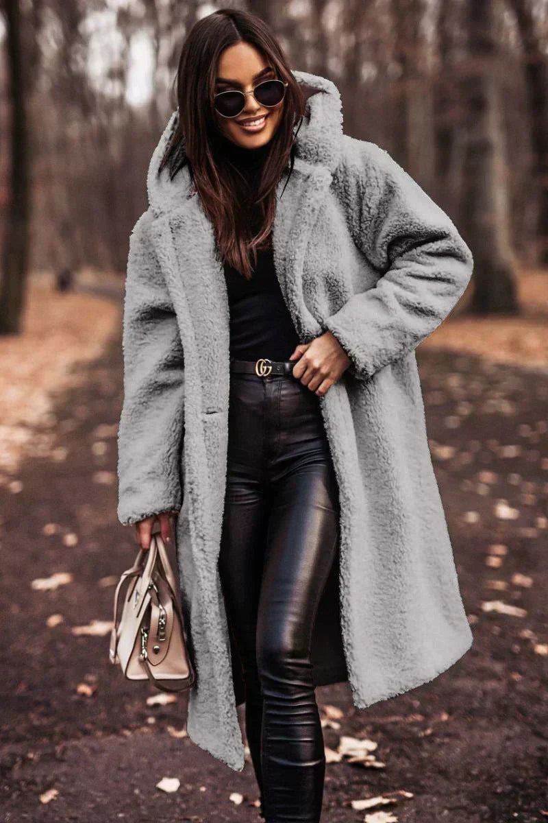 Women's long hooded coat loose fit open front design with pockets for cold weather comfort