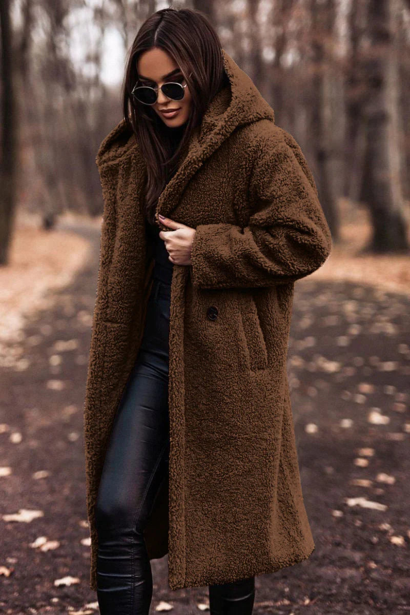 Women's plush coat warm cozy soft relaxed fit sustainable layering outerwear modern silhouette