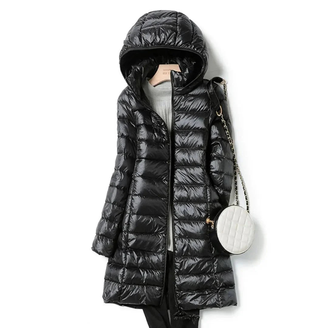 Women's black longline hooded puffer coat lightweight wind resistant winter essential sleek silhouette