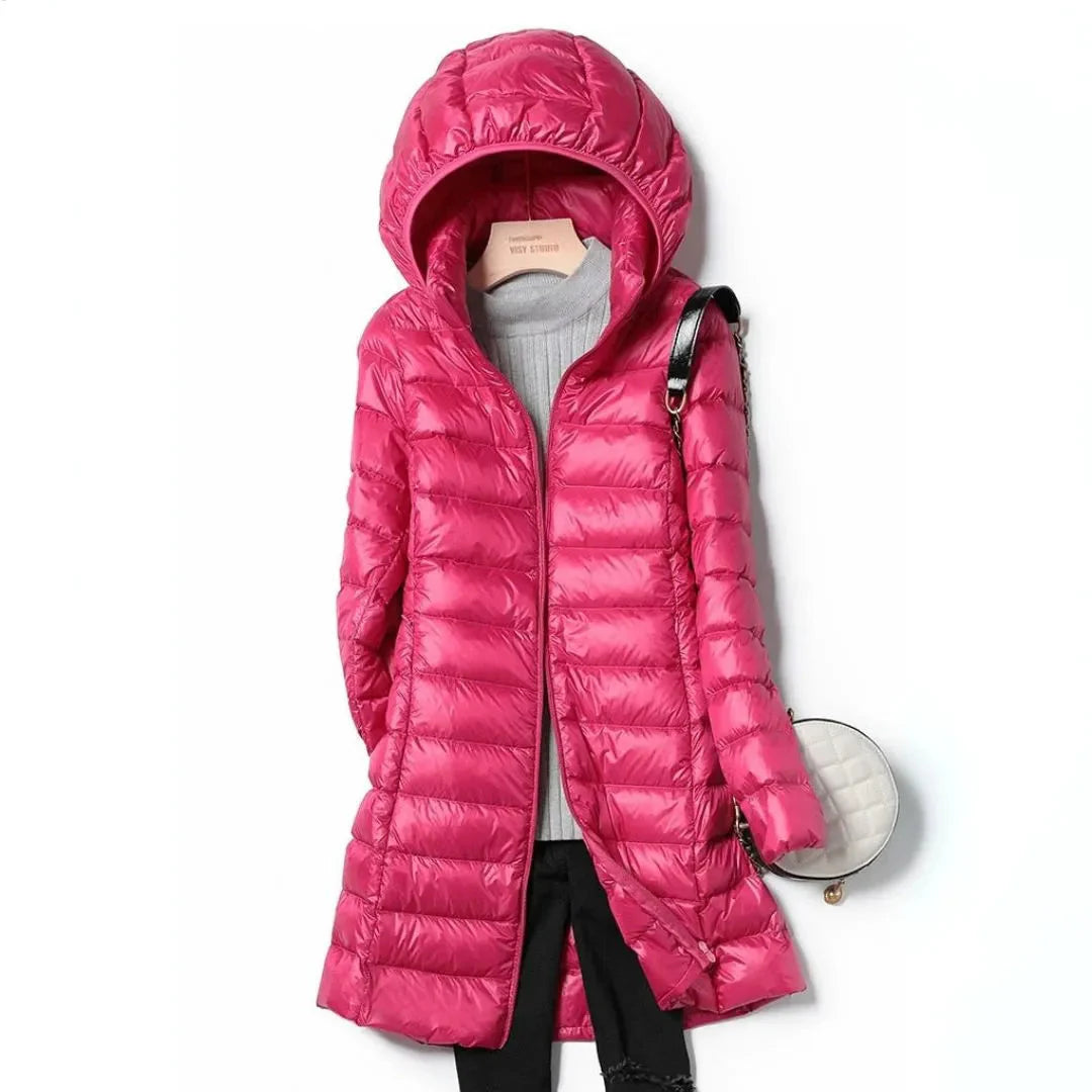 Women's black longline hooded puffer coat lightweight wind resistant winter essential sleek silhouette