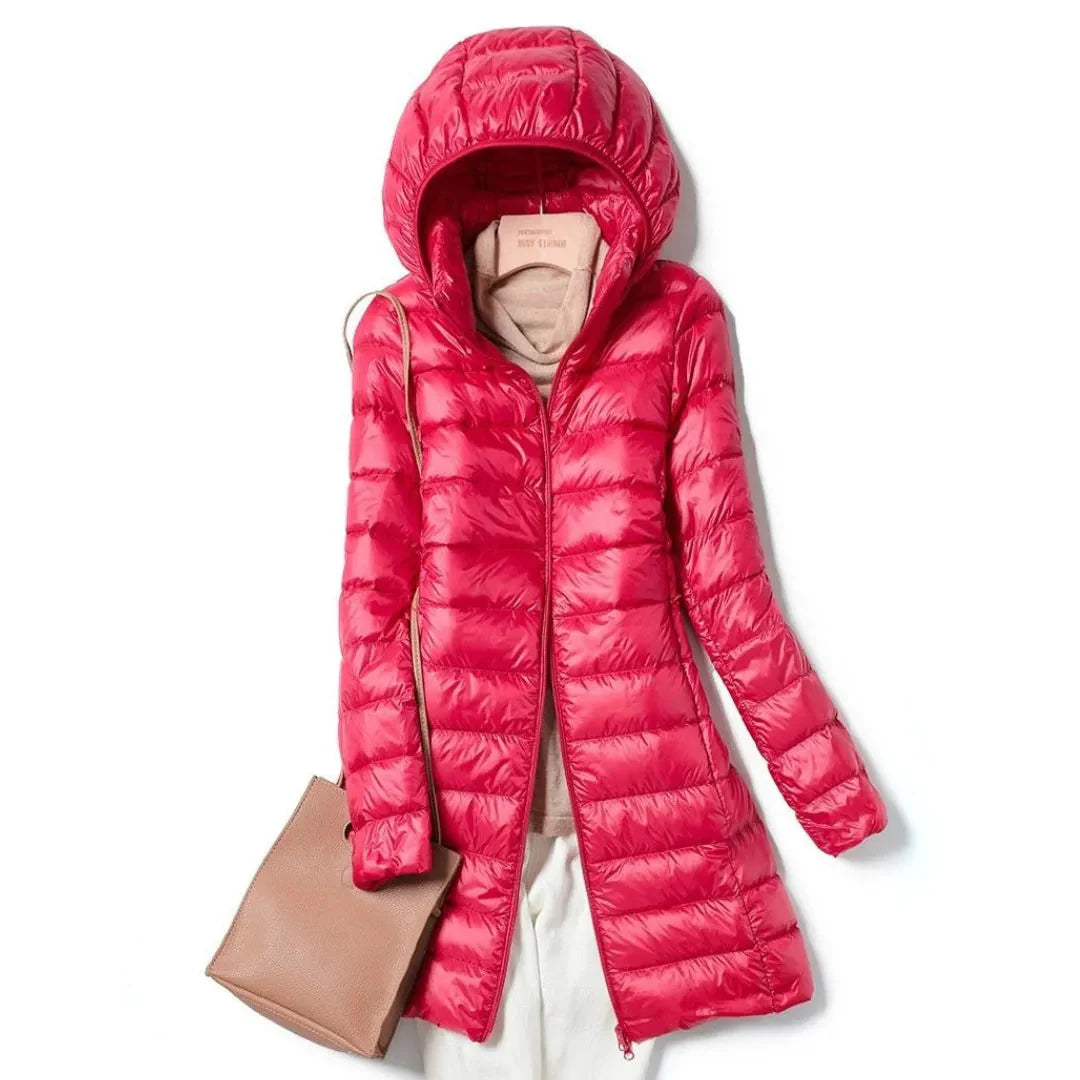 Women's black longline hooded puffer coat lightweight wind resistant winter essential sleek silhouette