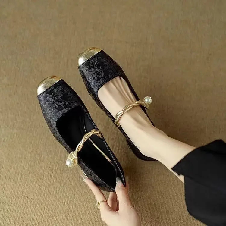 Women's brocade block heel pumps with pearl button strap and metallic toe cap