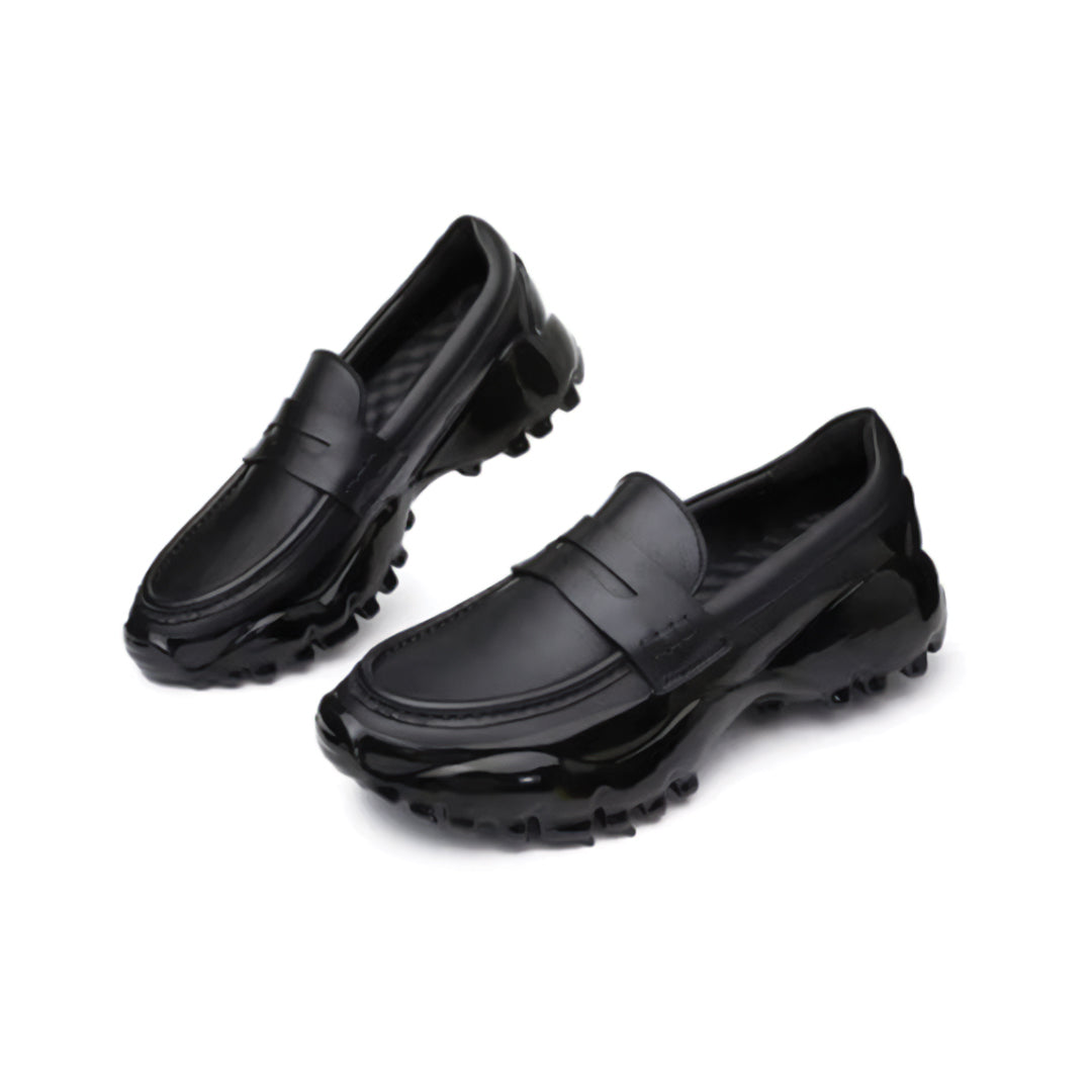 Magma Black genuine leather loafer with minimalist silhouette and bold thick enamel outsole for city professionals