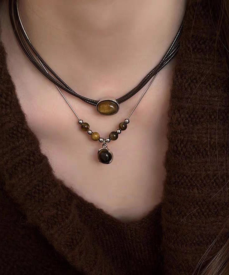 Ensemble de deux colliers pendentifs œil de tigre en patchwork de cuir neuf - Urbann-Vibe