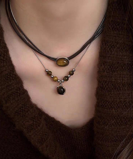 Ensemble de deux colliers pendentifs œil de tigre en patchwork de cuir neuf - Urbann-Vibe