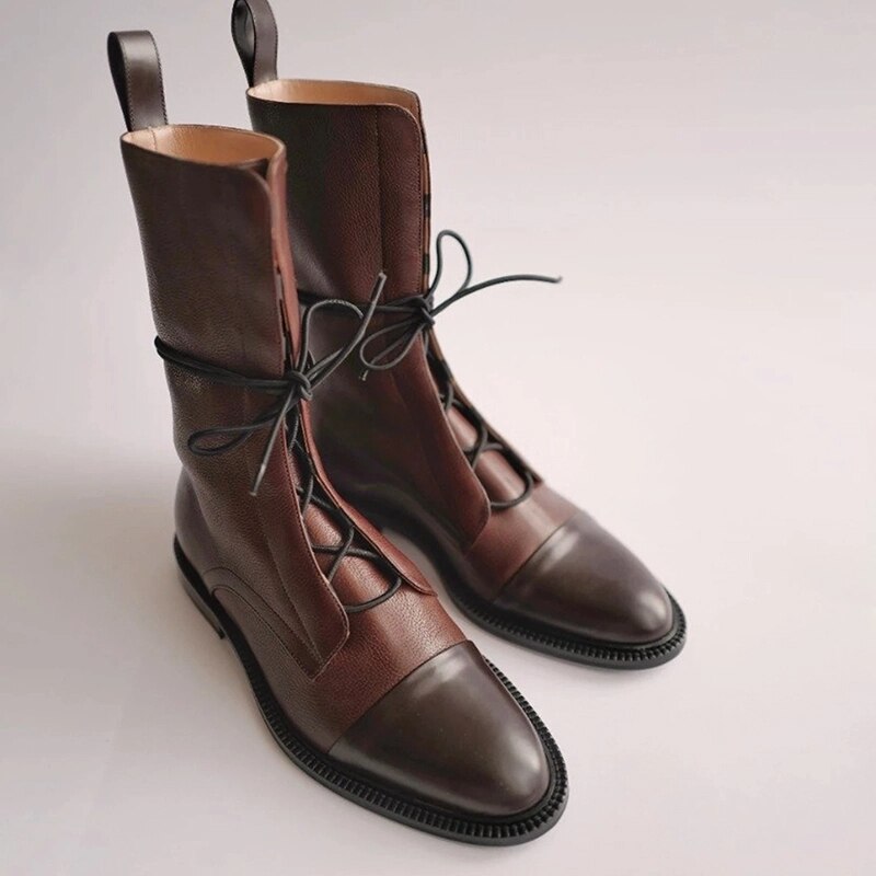 Ella women's black lace-up combat boots with polished toe detail for everyday confident style