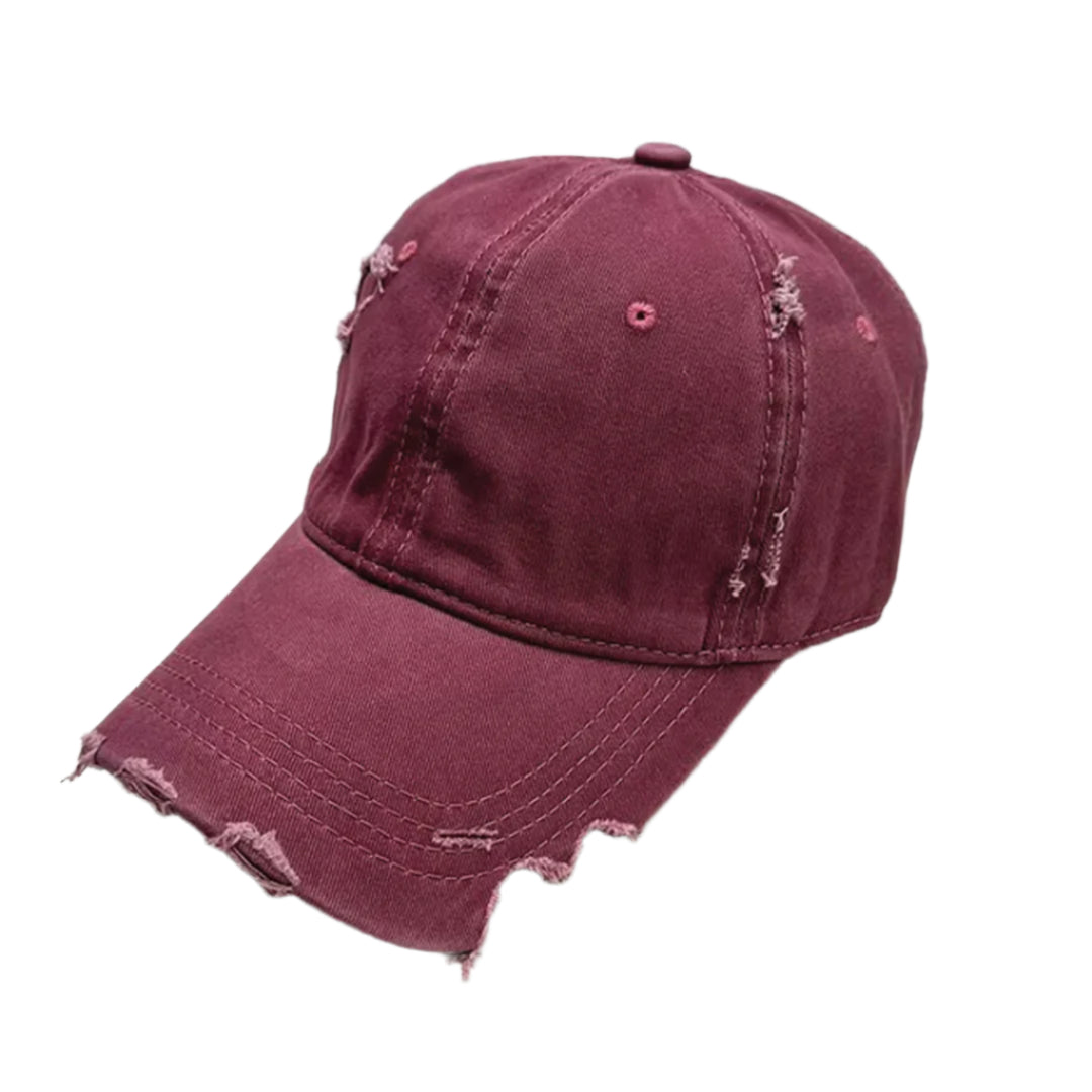 Distressed black cotton baseball cap with sliced brim and hand-worn streetwear detailing