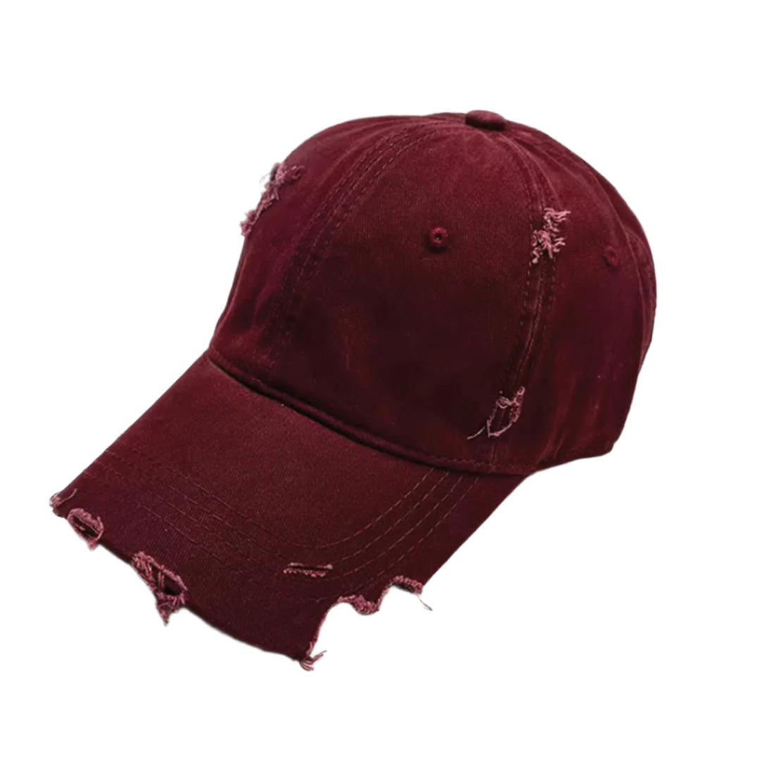 Distressed black cotton baseball cap with sliced brim, hand-distressed streetwear style and adjustable fit