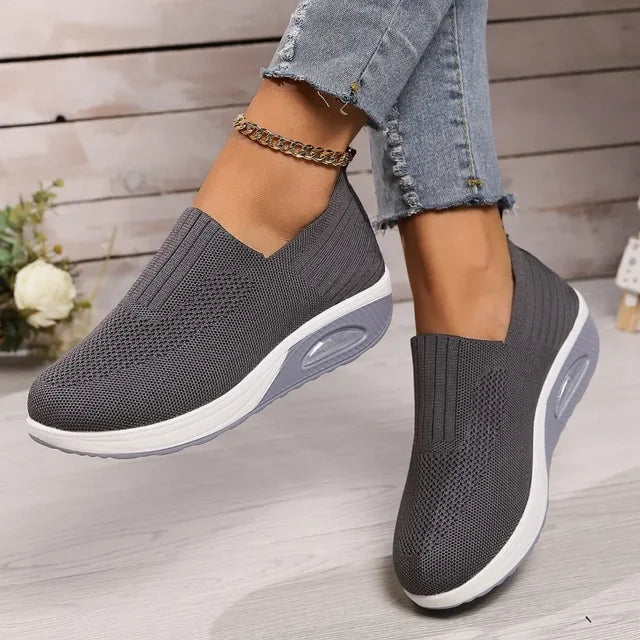 Women's slip-on knit sneakers with air-cushioned lightweight sole for breathable everyday comfort fit