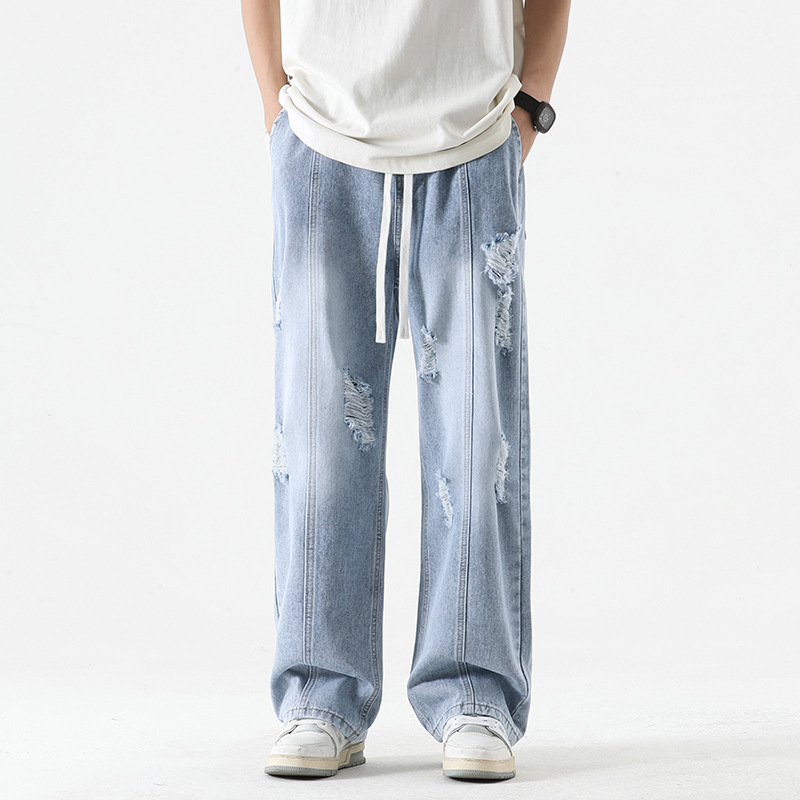 Nexus distressed denim joggers wide-leg washed blue streetwear adjustable drawstring